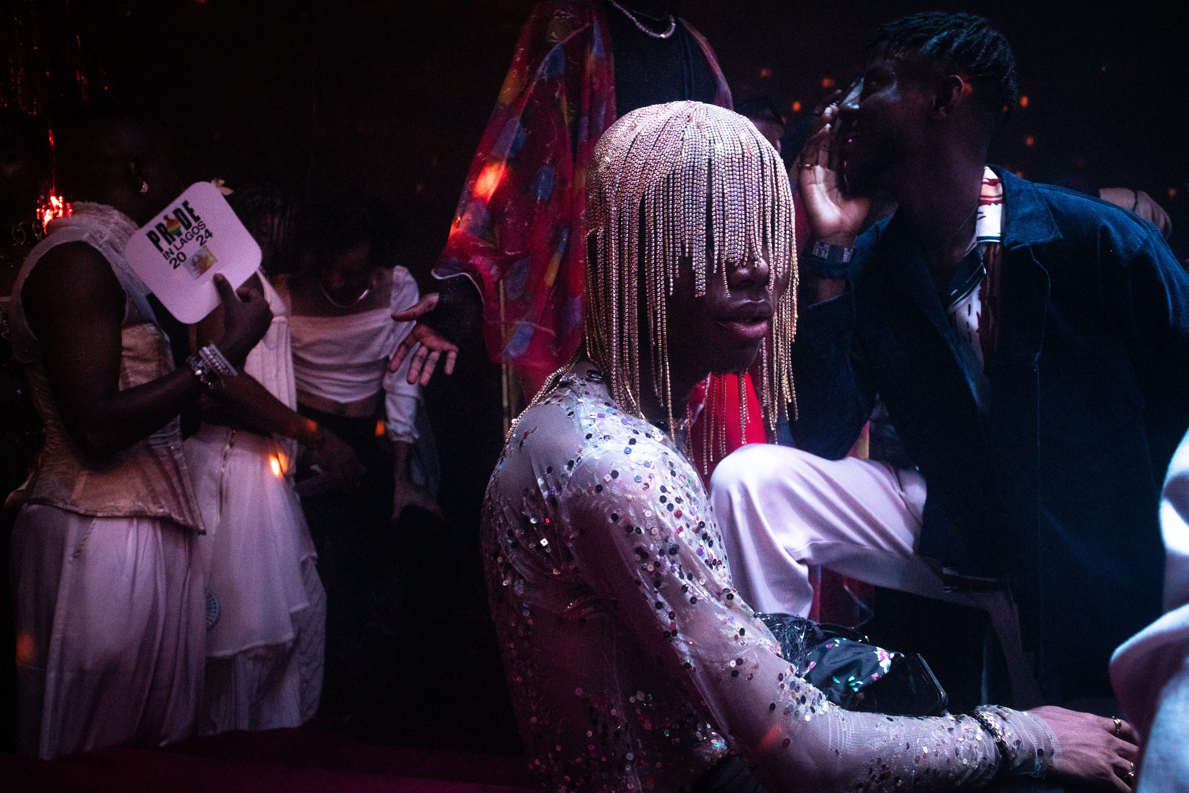 Person with beaded headwear